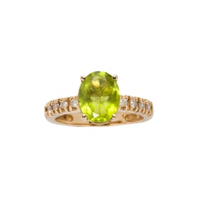 A peridot, diamond and 14k gold ring