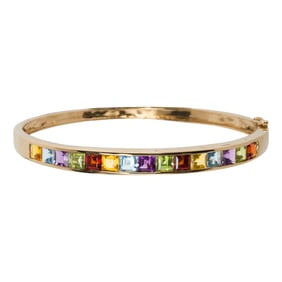 A gemstone and 14k gold bracelet