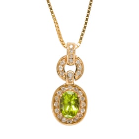 A peridot, diamond and 14k gold pendant-necklace