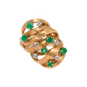 An emerald, diamond and 14k gold ring