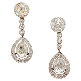 A pair of antique diamond and platinum-topped gold earrings