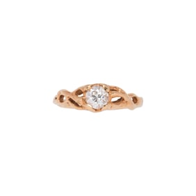 A diamond and 14k gold ring
