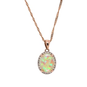 An opal, diamond and gold pendant necklace