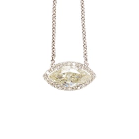 A diamond and white gold necklace