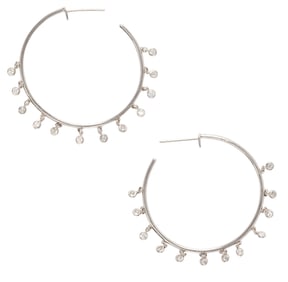 A pair of diamond and 14k white gold hoops