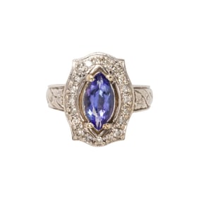 A tanzanite, diamond and 14k white gold ring