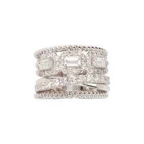 A diamond and 14k white gold ring