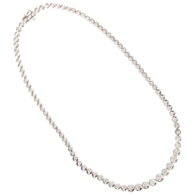 A diamond and 14k white gold tennis necklace