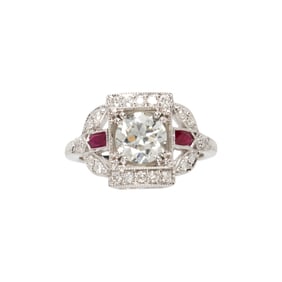A diamond, ruby and 18k white gold ring