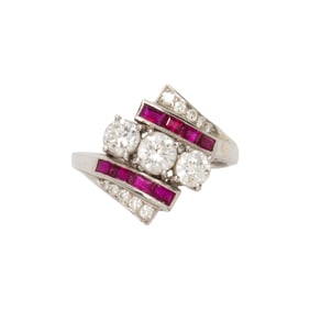 A diamond, synthetic ruby and platinum ring