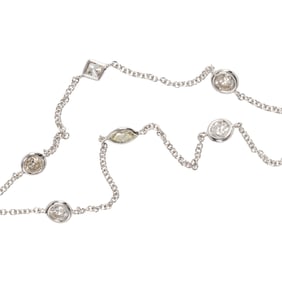 A diamond and 14k white gold necklace