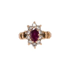 A diamond, red stone and 14k gold ring