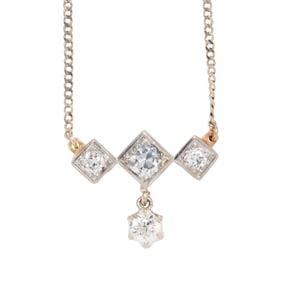 A diamond and 14k white gold necklace