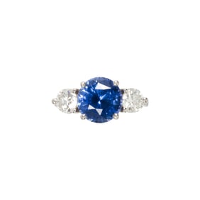 A sapphire, diamond and platinum ring