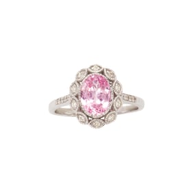 A pink sapphire, diamond and 14k white gold ring
