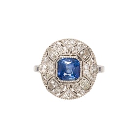 A sapphire, diamond and platinum ring