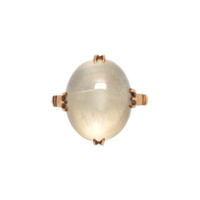 A moonstone and 18k gold ring