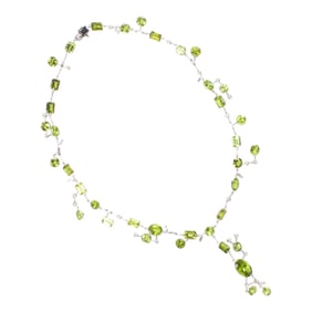 A peridot, diamond and white gold necklace