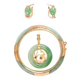 A group of jade jewelry