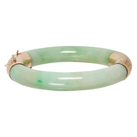 A jade and 14k bangle bracelet