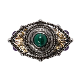 A gemstone and silver ring