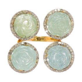 An aquamarine, diamond silver and 14k gold ring