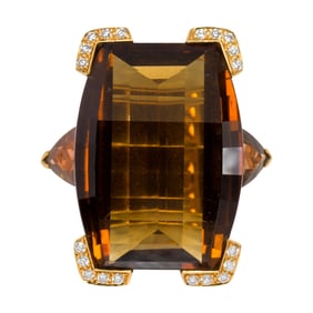 A smoky quartz, diamond and 18k gold ring