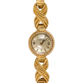 A vintage Cartier 18k gold backwind ladies watch