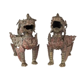 A pair of Tibetan bronze guardian lions