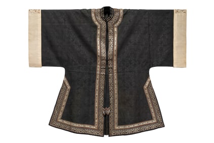 A Chinese black ground brocade informal lady's robe