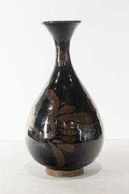 A Chinese Henan black glazed and russet splashed yuhuchun vase