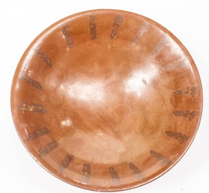A Chinese brown glazed bowl