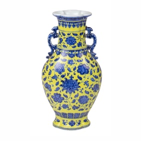 A Chinese yellow-ground blue and white handled vase