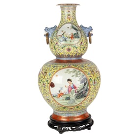 A Chinese famille rose yellow-ground double gourd vase