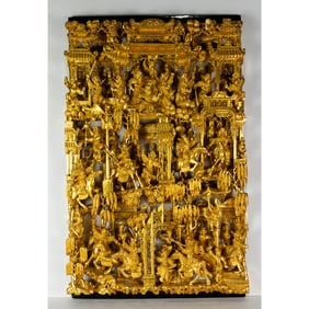 A Chinese gilt lacquered wall hanging panel
