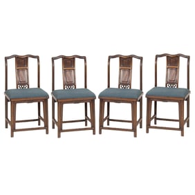 A set of four Chinese huali yoke-back chairs