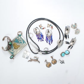 A group of mostly Native American silver items