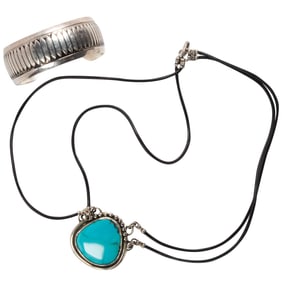A group of silver jewelry