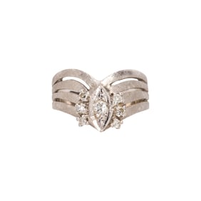 A diamond and 14k white gold ring