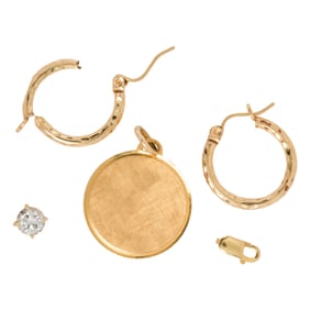 A group of gold jewelry