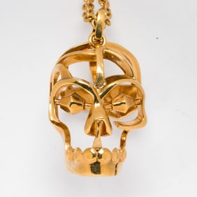 An Alexander McQueen gilt metal necklace