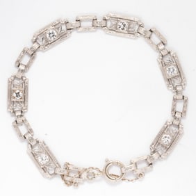 A diamond and 14k gold bracelet