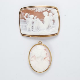 A pair of cameo and 14k gold brooches