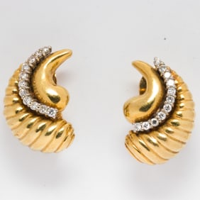 A pair of diamond and 14k gold earrings