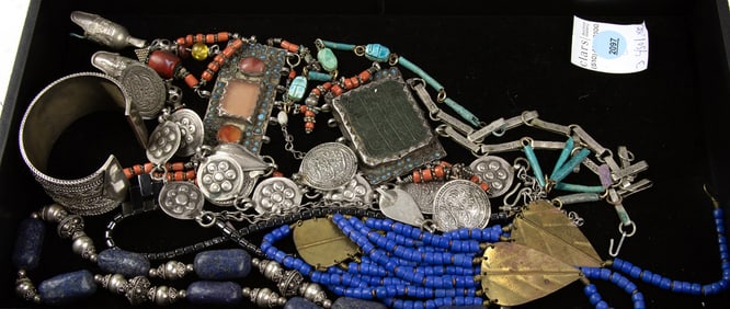 A lot of Ethnic jewelry, including a Persian coin necklace and a Tibetan necklace fitted with
