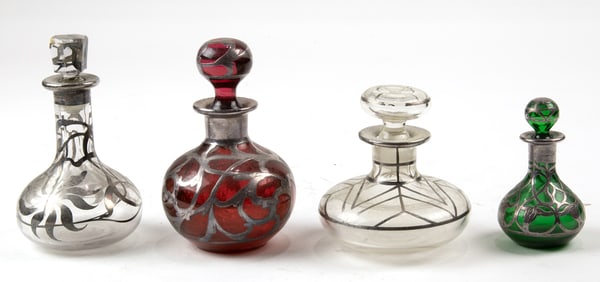 Four Art Nouveau silver overlay glass scent bottles