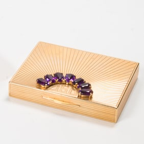 An European 14k gold cigarette case fitted with sapphire thumbpiece