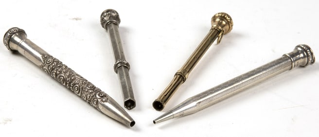 Four mechanical pens or pencils, two marked sterling and two fitted with stones, the longest 4.75"l