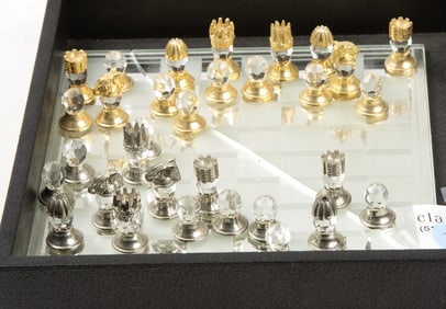 A Swarovski crystal and metallic chess set