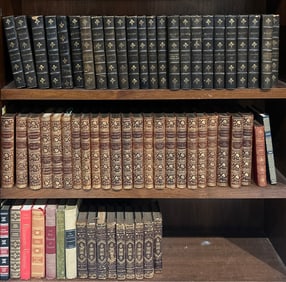 A collection of leather bound books sets, including Works of George Elliot Rosehill Limited Edition